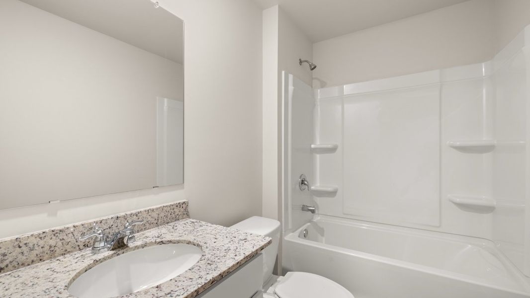 Representative furnished interior of a home built from the Elle by D.R. Horton in South Wind, South Fulton (Image 14).