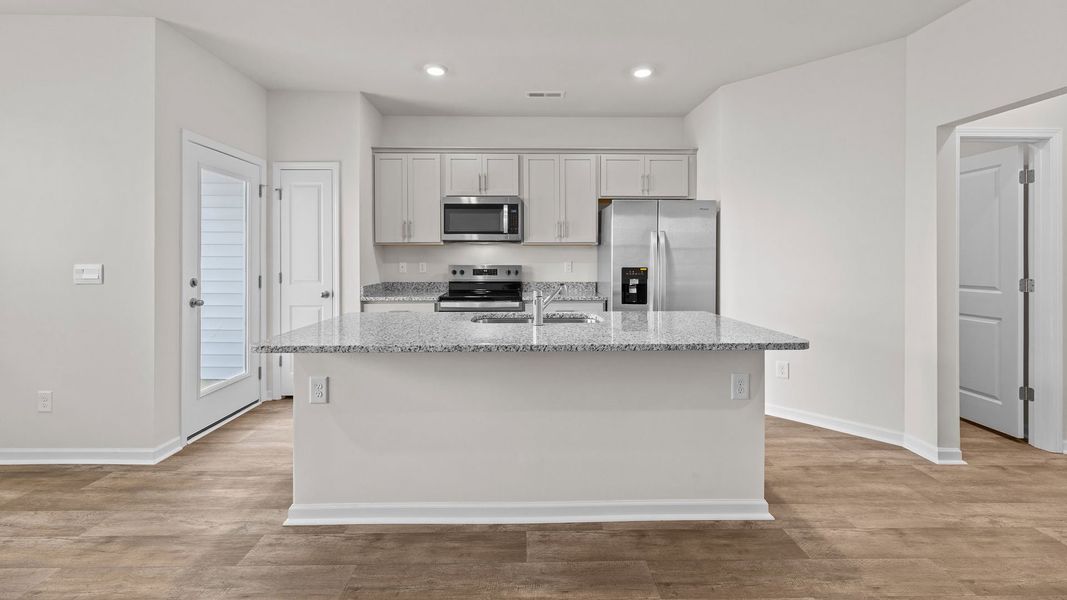 Furnished interior view inside a new home in The Townes at Ridgewood Farms, Winterville (Image 3).