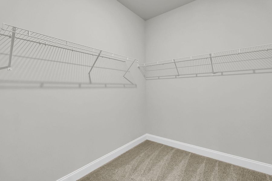 Spacious, unfurnished interior of a new home in Tidewater at Lakes of Cane Bay, Summerville (Image 22).