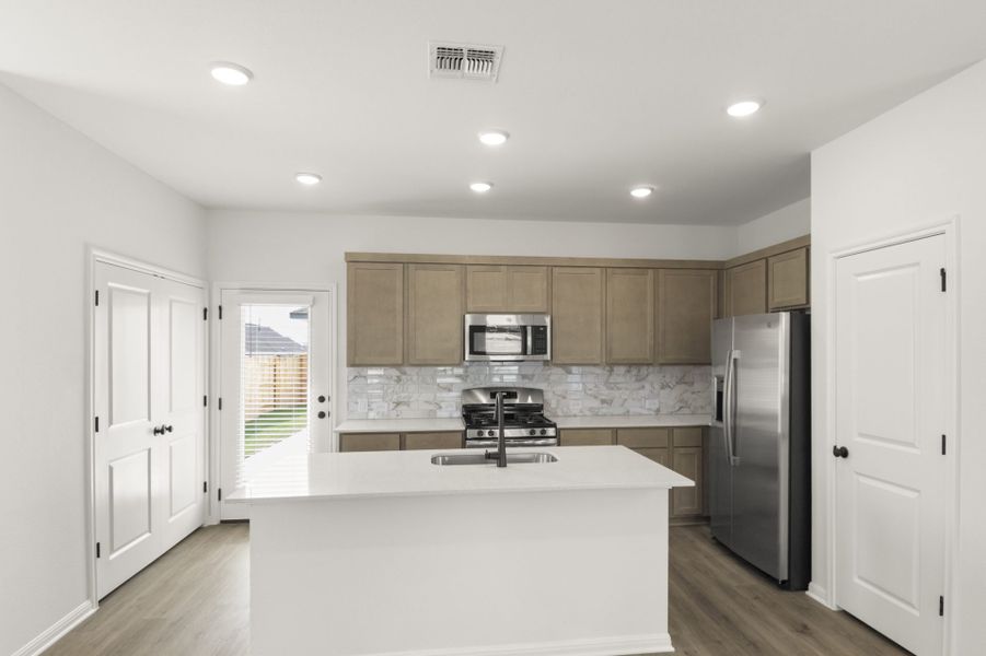 Furnished interior view inside a new home in Trace, San Marcos (Image 13).