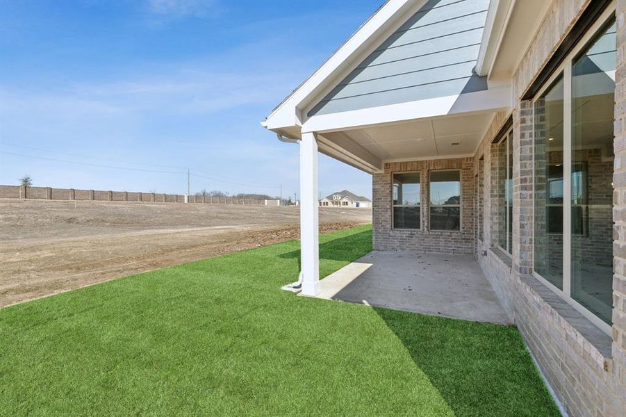 View of yard with a patio area