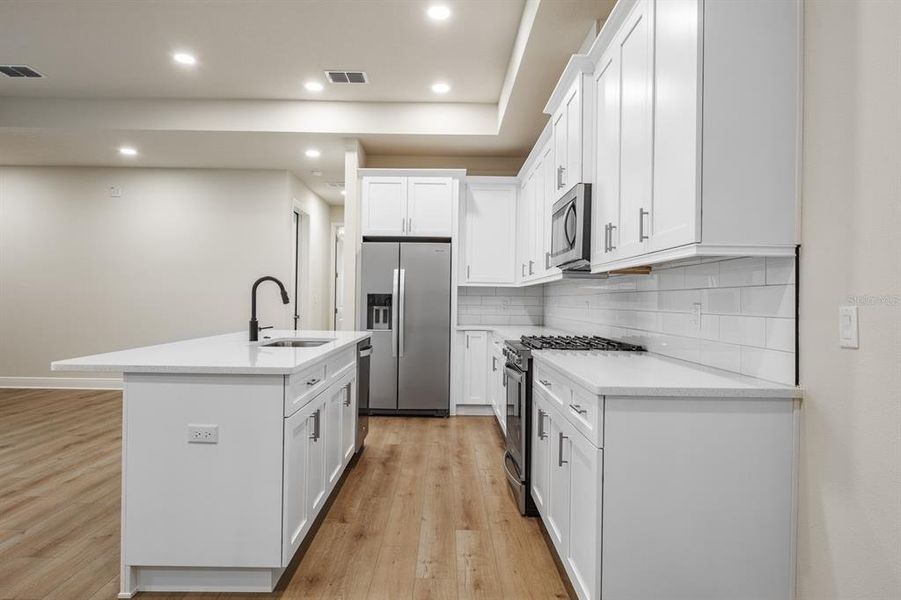 Furnished interior view inside a new home in , Clearwater (Image 6). Furnished interior view inside a new home in , Clearwater (Image 6).