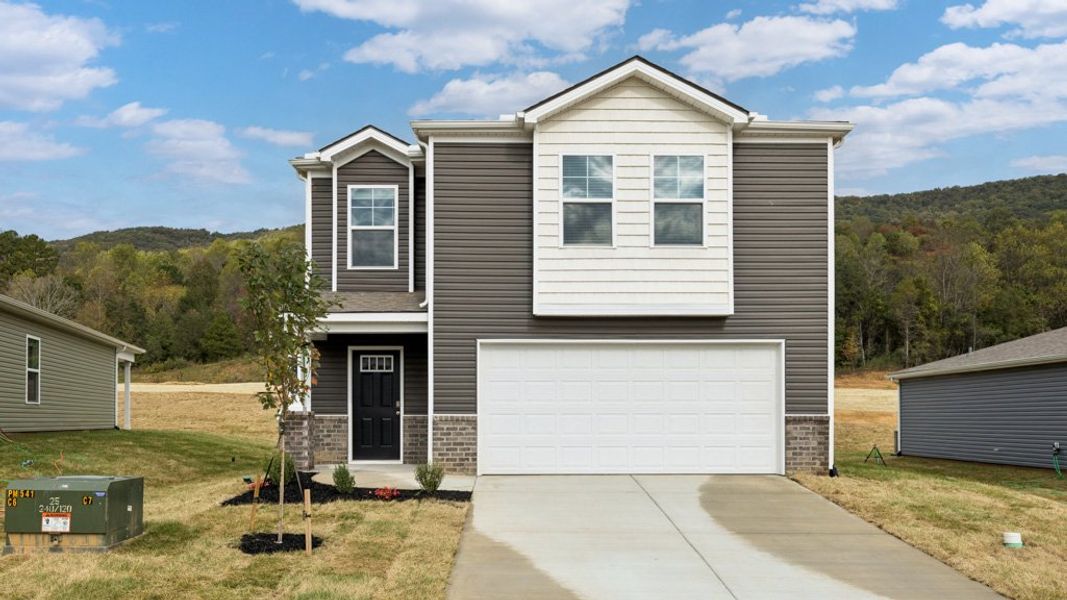 Front exterior of a new home in Emory Creek, Harriman, TN, highlighting curb appeal (Image 1).
