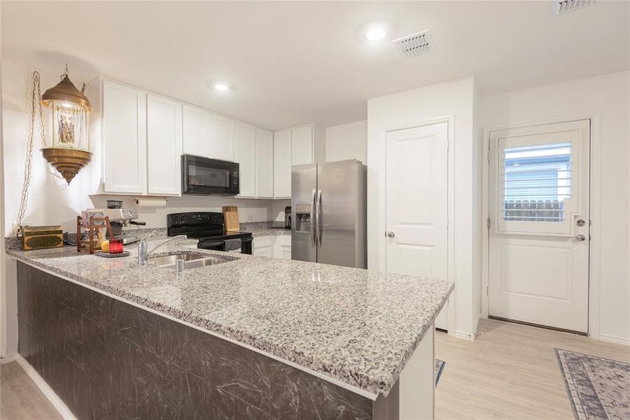 Furnished interior view inside a new home in Tillage Farms, Princeton (Image 15).