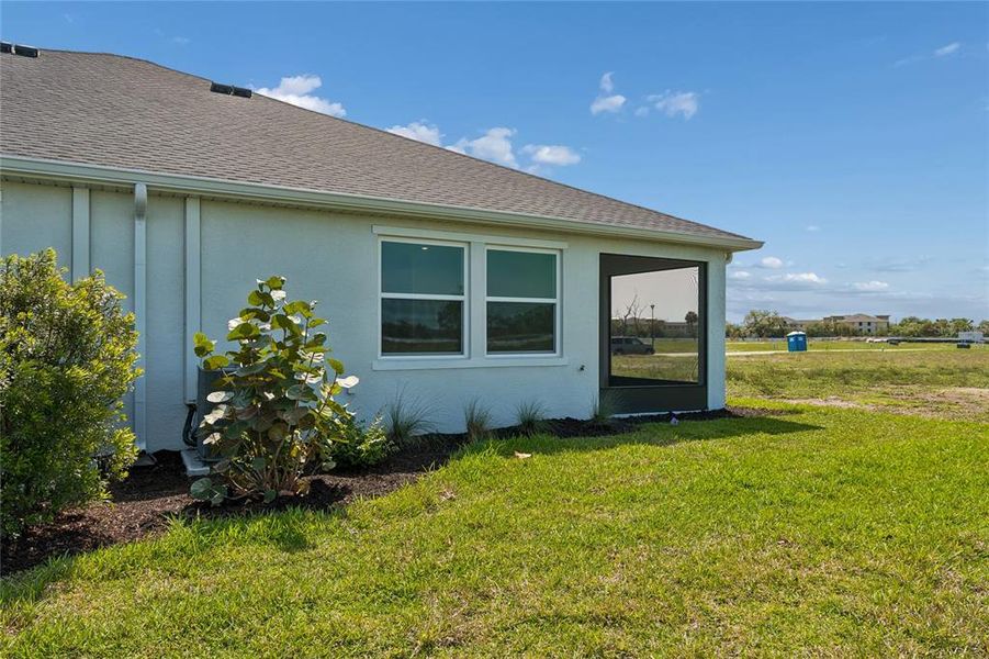 Exterior details and patio area of a home in Gracewater at Sarasota, Sarasota (Image 27).