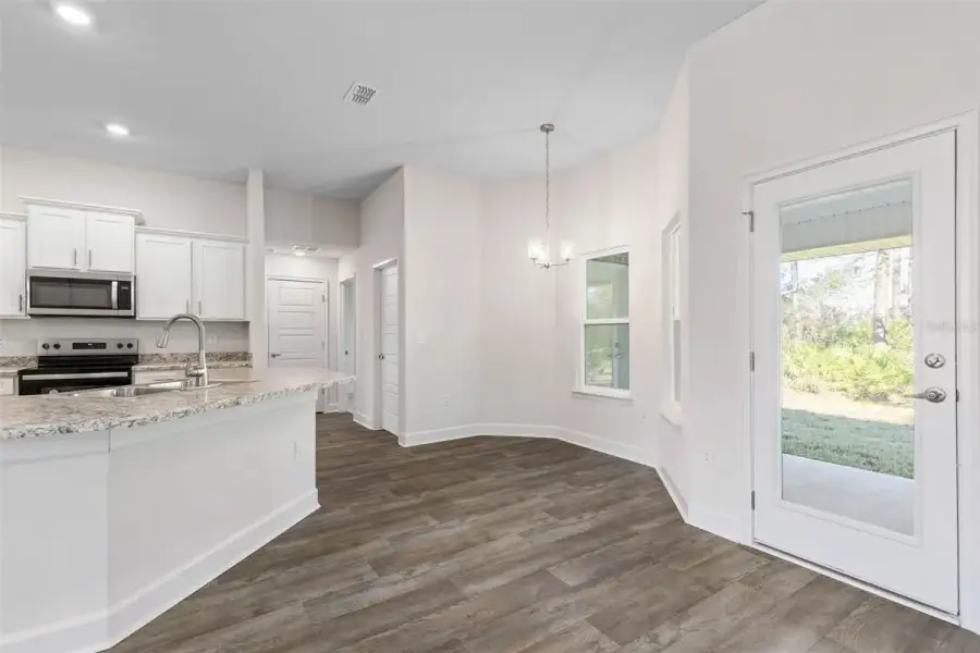 Representative furnished interior of a home built from the 2265 by Adams Homes in Flagler Estates, Hastings (Image 11).