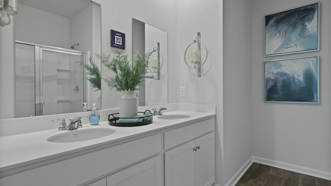 Representative furnished interior of a home built from the Glenwood by D.R. Horton in Pine Hills at Cane Bay, Summerville (Image 27).