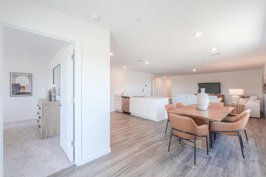 A room with a table and chairs. A room with a table and chairs.