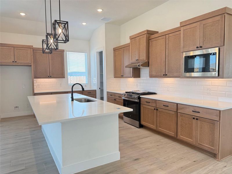 Furnished interior view inside a new home in Wood Leaf Reserve, Tomball (Image 5).