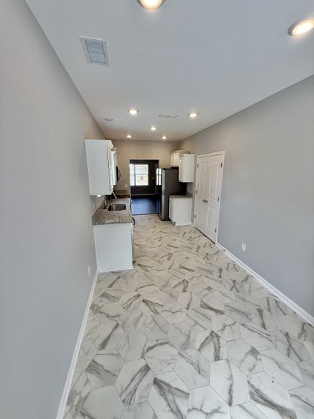 Spacious, unfurnished interior of a new home in Stonehenge, Manchester (Image 7).