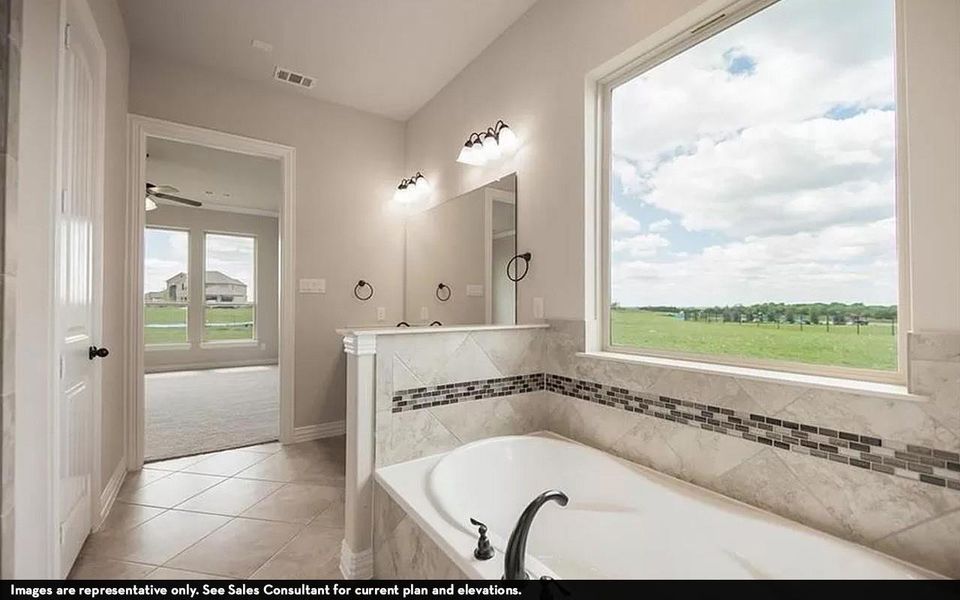 Furnished interior view inside a new home in Marvida, Cypress (Image 8).