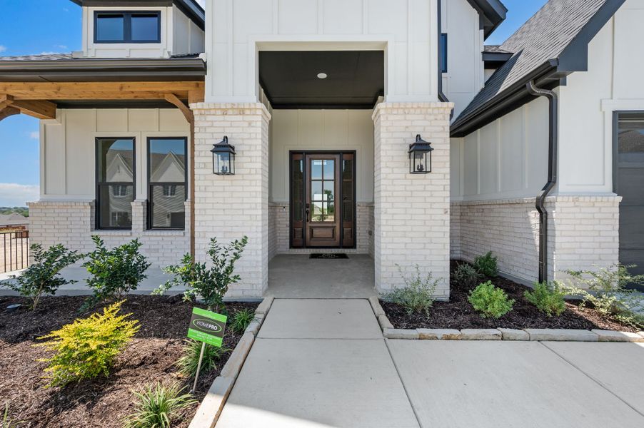 Exterior details and patio area of a home in Parks of Aledo, Aledo (Image 3).