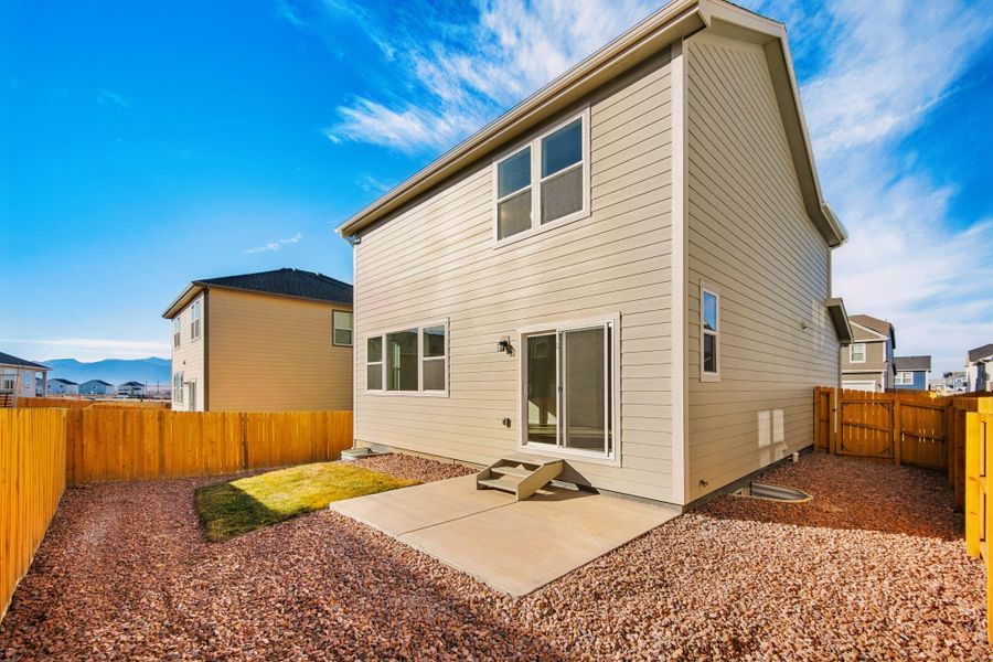 Exterior details and patio area of a home in Ridge at Lorson Ranch, Colorado Springs (Image 4).