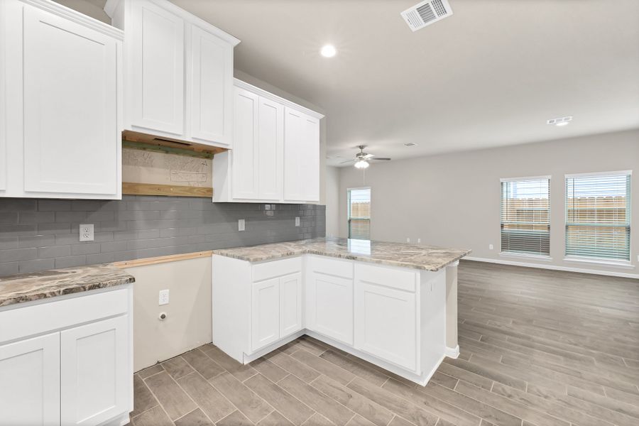 Representative furnished interior of a home built from the Floor Plan 1427 by Colina Homes in River Ranch, Dayton (Image 14).