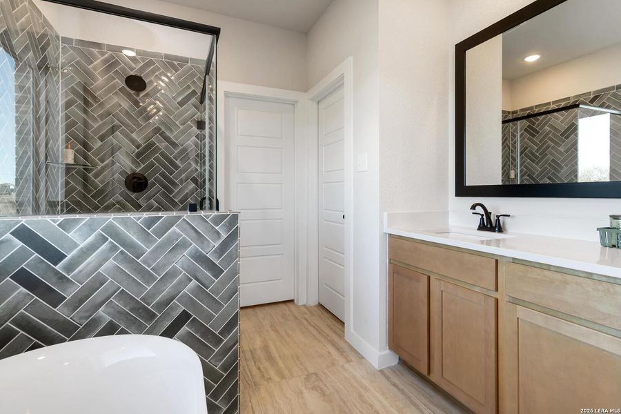 Furnished interior view inside a new home in Alamo Estates, San Antonio (Image 36).