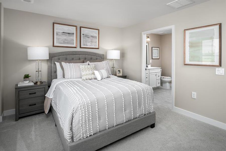 Representative furnished interior of a home built from the Nassau Cove Quick Move-In by Ryan Homes in Anderson Farm, Calabash (Image 10).