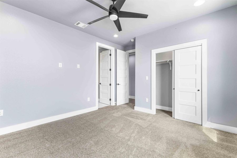 Unfurnished bedroom with recessed lighting, carpet floors, a closet, and a ceiling fan Unfurnished bedroom with recessed lighting, carpet floors, a closet, and a ceiling fan