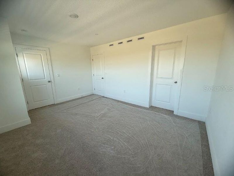 Spacious, unfurnished interior of a new home in Parkview at Hamlin, Winter Garden (Image 9).