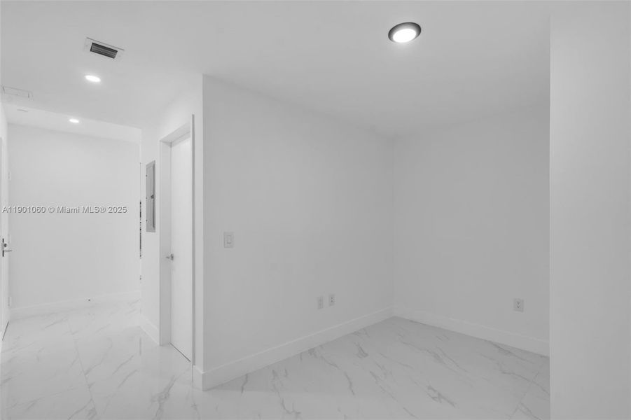Spacious, unfurnished interior of a new home in Aria Reserve, Miami (Image 36). Spacious, unfurnished interior of a new home in Aria Reserve, Miami (Image 36).