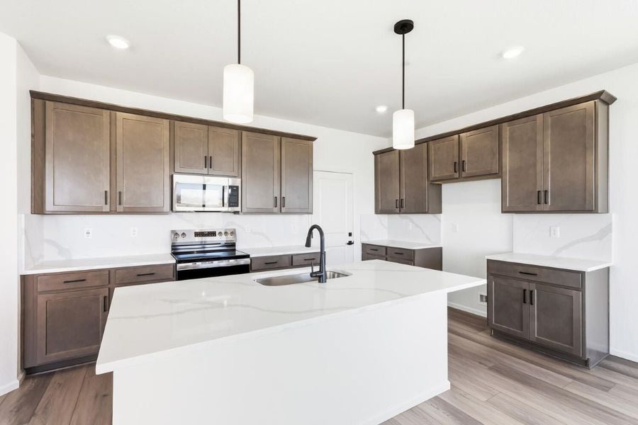Furnished interior view inside a new home in The Nest Reserve at Canyon Creek, Erie (Image 6).