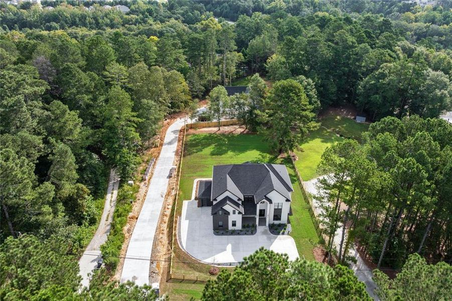Front exterior of a new home in , Lawrenceville, GA, highlighting curb appeal (Image 28).