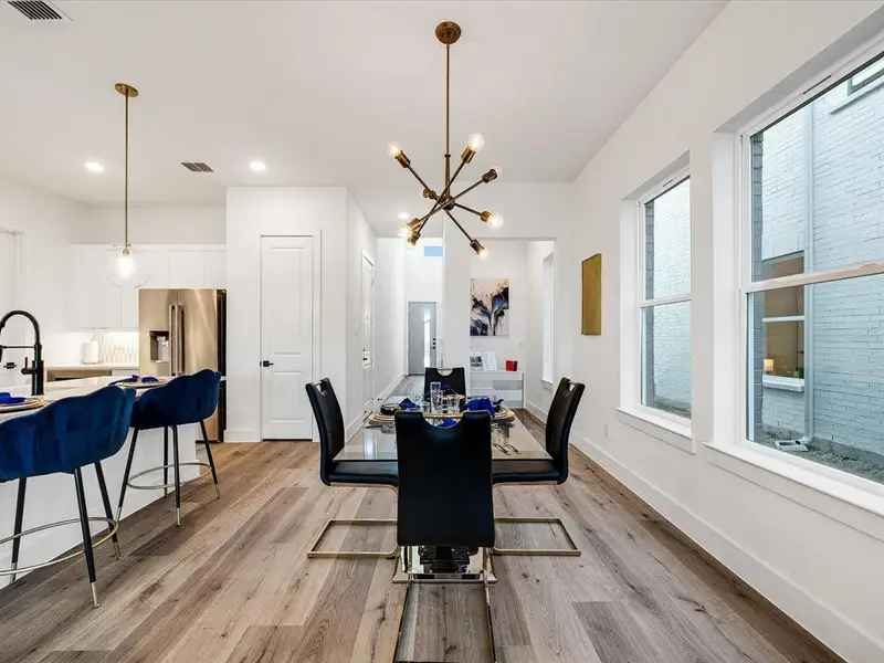Furnished interior view inside a new home in Royal Court, Little Elm (Image 7).