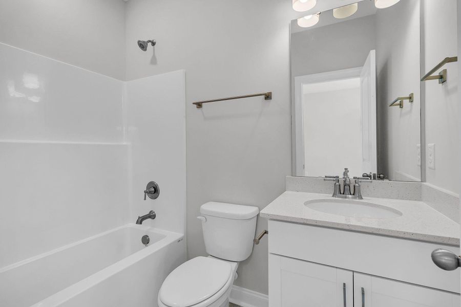 Furnished interior view inside a new home in Tidewater at Lakes of Cane Bay, Summerville (Image 13).