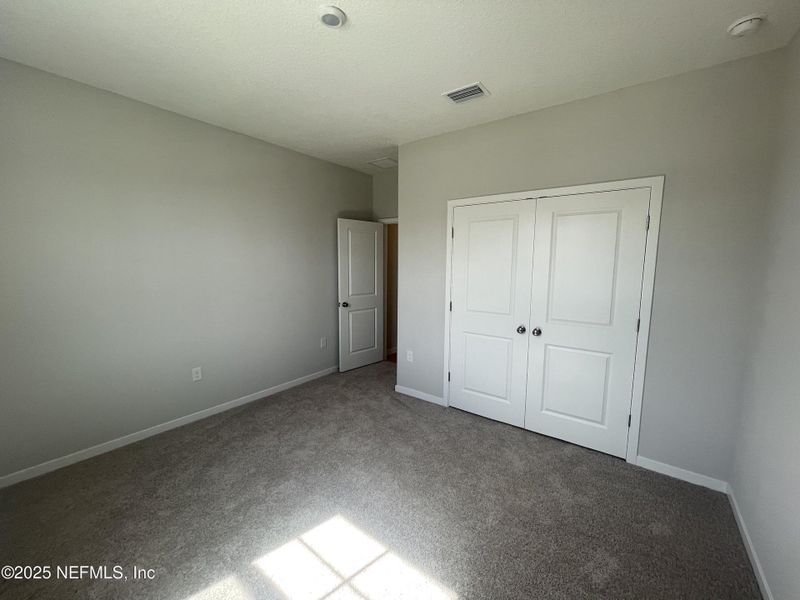 Spacious, unfurnished interior of a new home in Magnolia Series at Seminole Palms, Palm Coast (Image 28).