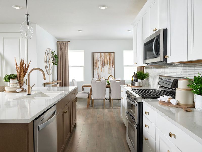 Furnished interior view inside a new home in The Aurora Highlands, Aurora (Image 5).
