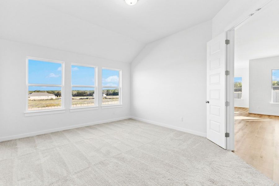 Spacious, unfurnished interior of a new home in The Colony, Bastrop (Image 30).