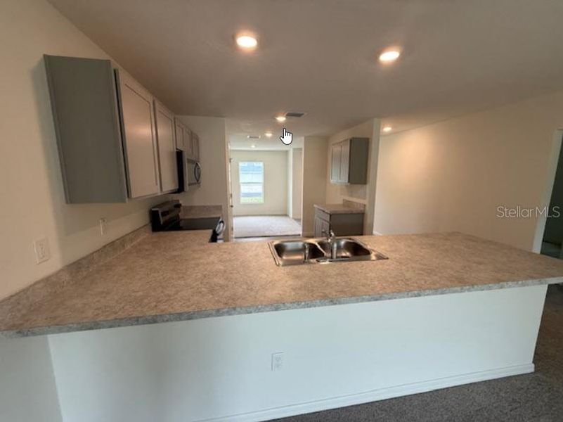 Furnished interior view inside a new home in Palm Coast: Value Collection, Palm Coast (Image 6).