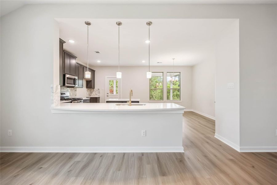 Furnished interior view inside a new home in Deer Pines, Conroe (Image 7).