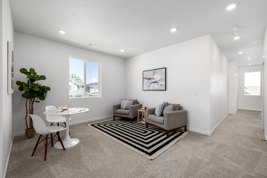 Furnished interior view inside a new home in Painted Prairie, Aurora (Image 7).
