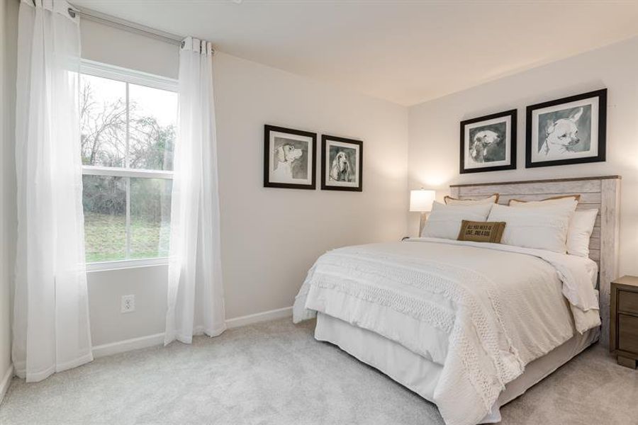 Representative furnished interior of a home built from the Tate by Ryan Homes in Middle Creek Village Coastal Cottages & Villas, Bolivia (Image 21).