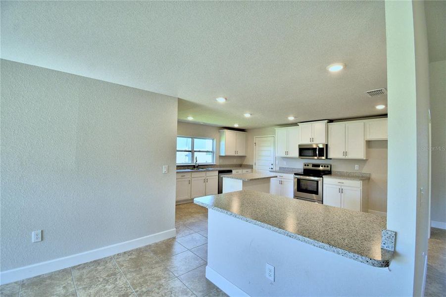 Furnished interior view inside a new home in Cadence Crossing, Auburndale (Image 5). Furnished interior view inside a new home in Cadence Crossing, Auburndale (Image 5).