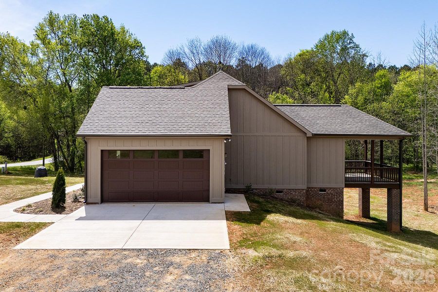 Front exterior of a new home in , Norwood, NC, highlighting curb appeal (Image 26).