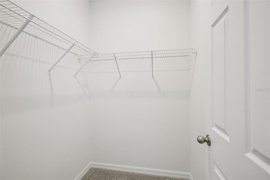 Spacious, unfurnished interior of a new home in Villamar - Signature Series, Winter Haven (Image 19).