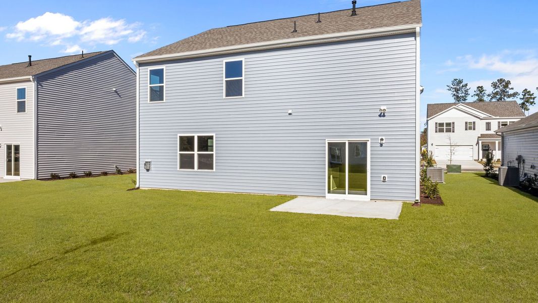 Exterior details and patio area of a home in West New Bern, New Bern (Image 24).