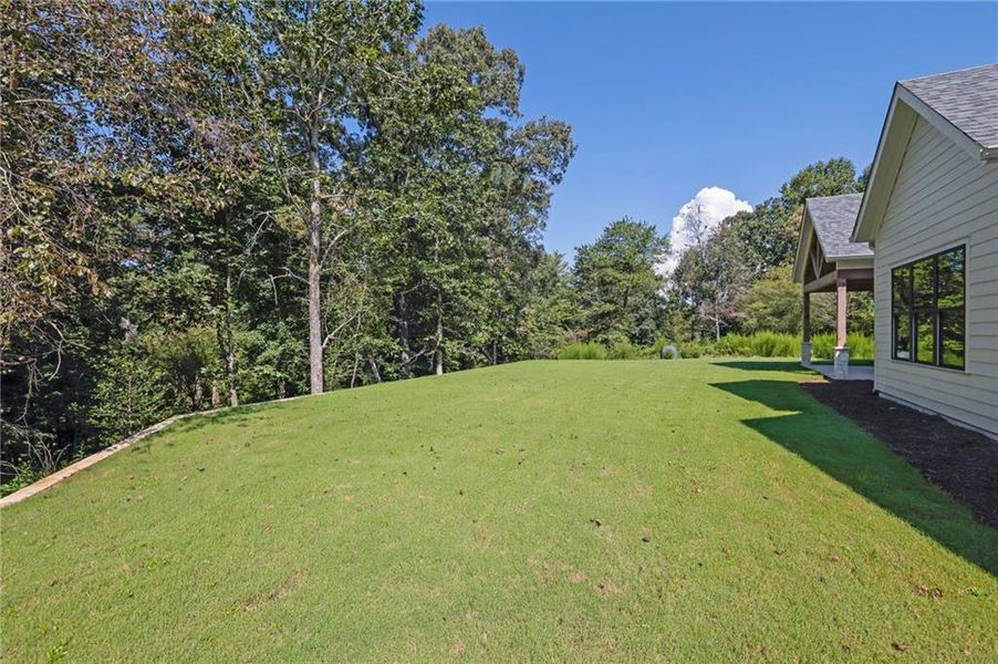 Exterior details and patio area of a home in , Ellijay (Image 27).