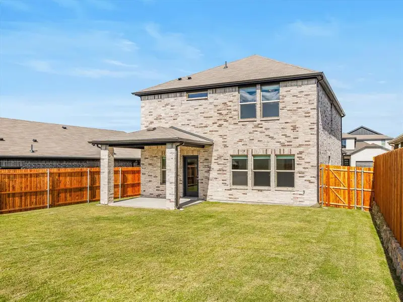 Exterior details and patio area of a home in Simpson Crossing - Spring Series, McKinney (Image 4).
