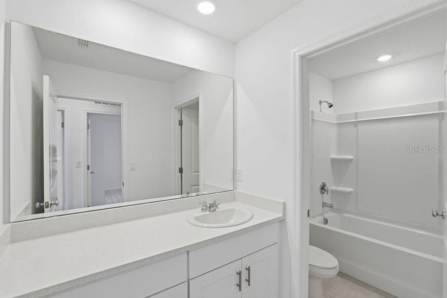 Furnished interior view inside a new home in Waterstone, Groveland (Image 8).