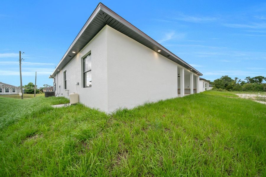 Exterior details and patio area of a home in , Lehigh Acres (Image 27). Exterior details and patio area of a home in , Lehigh Acres (Image 27).