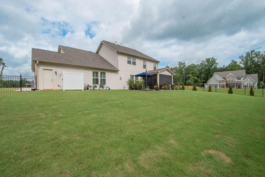 Front exterior of a new home in , Senoia, GA, highlighting curb appeal (Image 41). Front exterior of a new home in , Senoia, GA, highlighting curb appeal (Image 41).