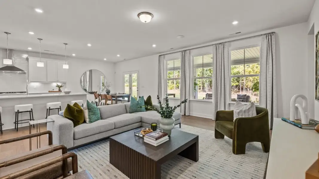 Open concept family room, gourmet kitchen, eat-in area, and elevated ceiling; The Townsend Design by DRB Homes in York, SC Open concept family room, gourmet kitchen, eat-in area, and elevated ceiling; The Townsend Design by DRB Homes in York, SC