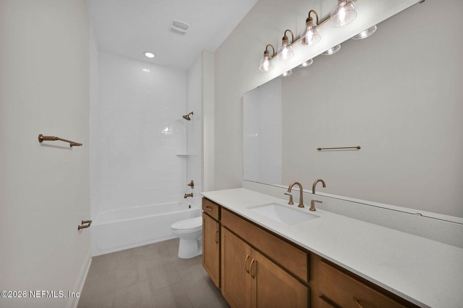 Furnished interior view inside a new home in Amelia National Country Club, Fernandina Beach (Image 14).