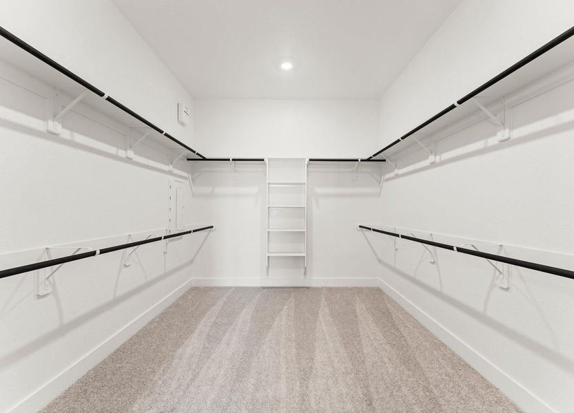 Spectacular Walk-in Closet at Primary Bedroom Spectacular Walk-in Closet at Primary Bedroom