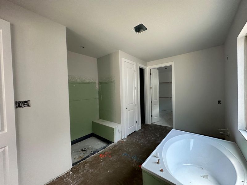 Walk-in shower & garden tub in Primary Bath