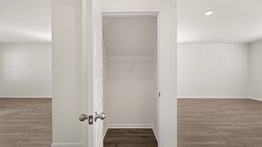 Representative unfurnished interior of a home built from the Mansfield by D.R. Horton in Brooks Station, Dacula (Image 16).