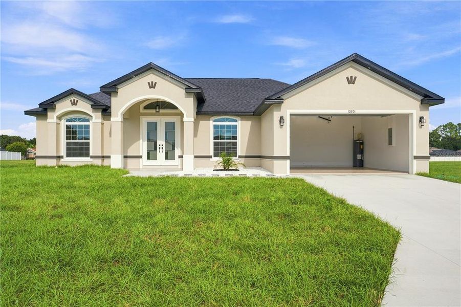 Front exterior of a new home in , Belleview, FL, highlighting curb appeal (Image 27).