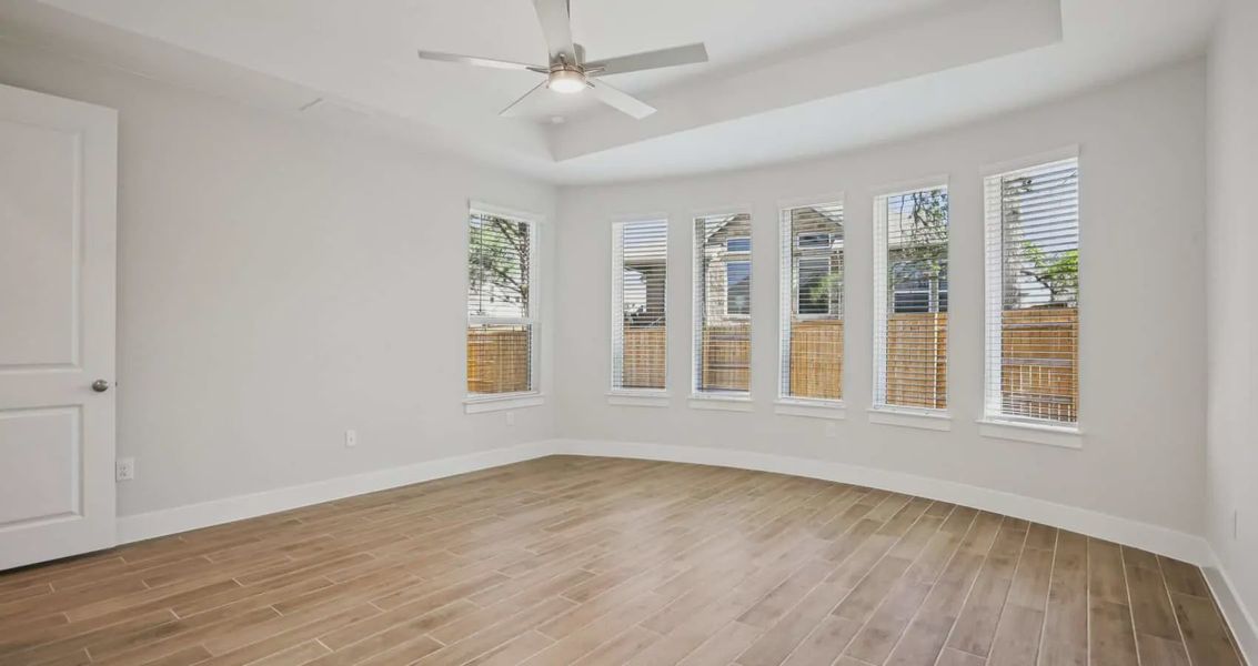 Spacious, unfurnished interior of a new home in 6 Creeks, Kyle (Image 18).